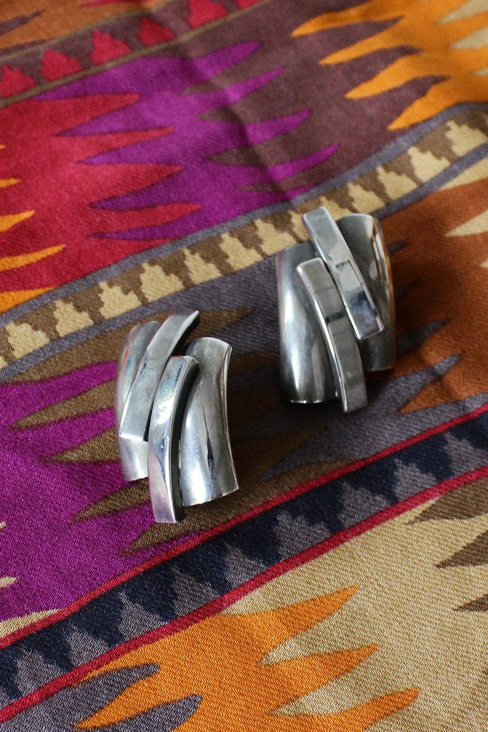 Abstract Silvertone Clip-ons