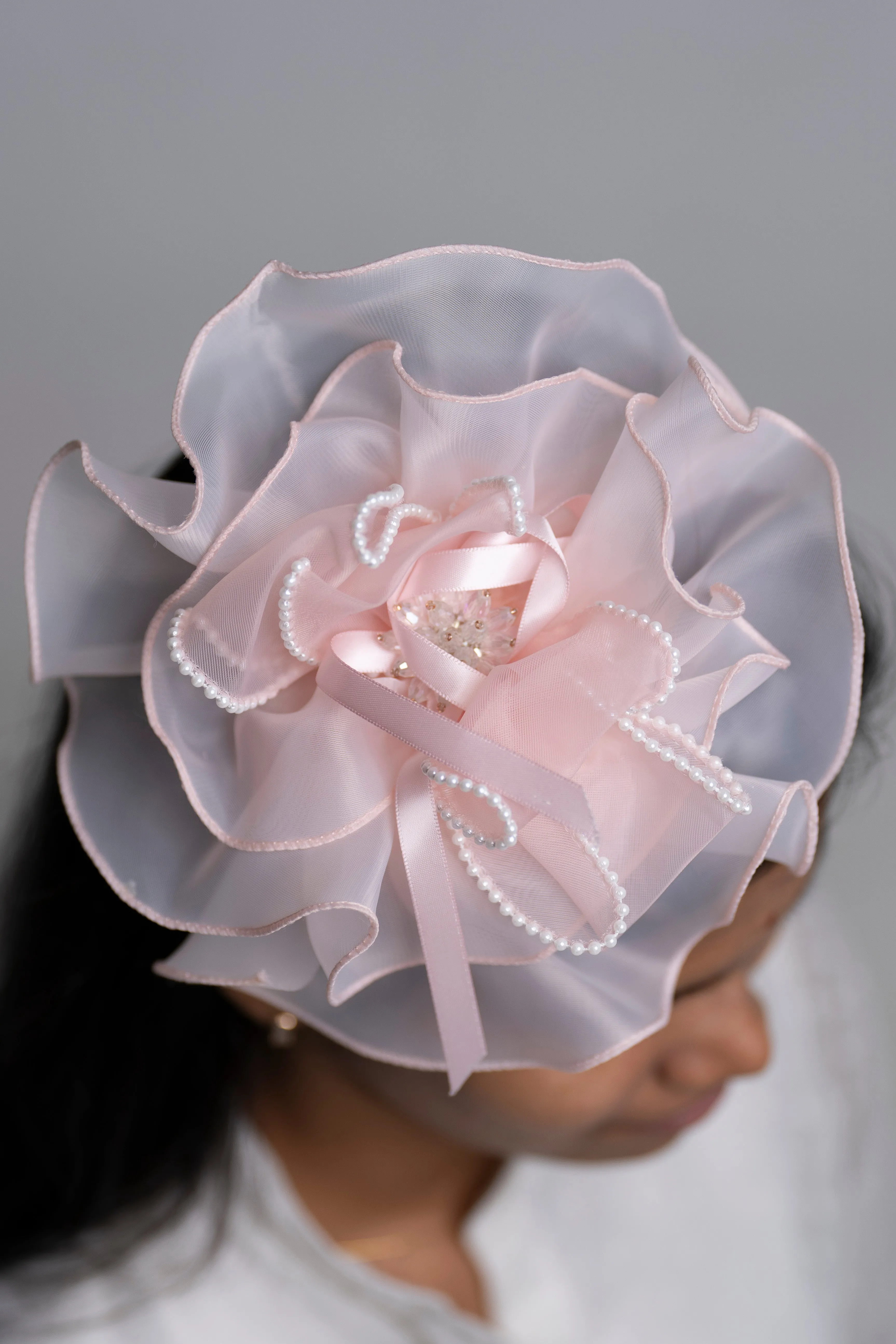 Elegant Blush Satin Flower Hair Clip with Pearl Embellishments