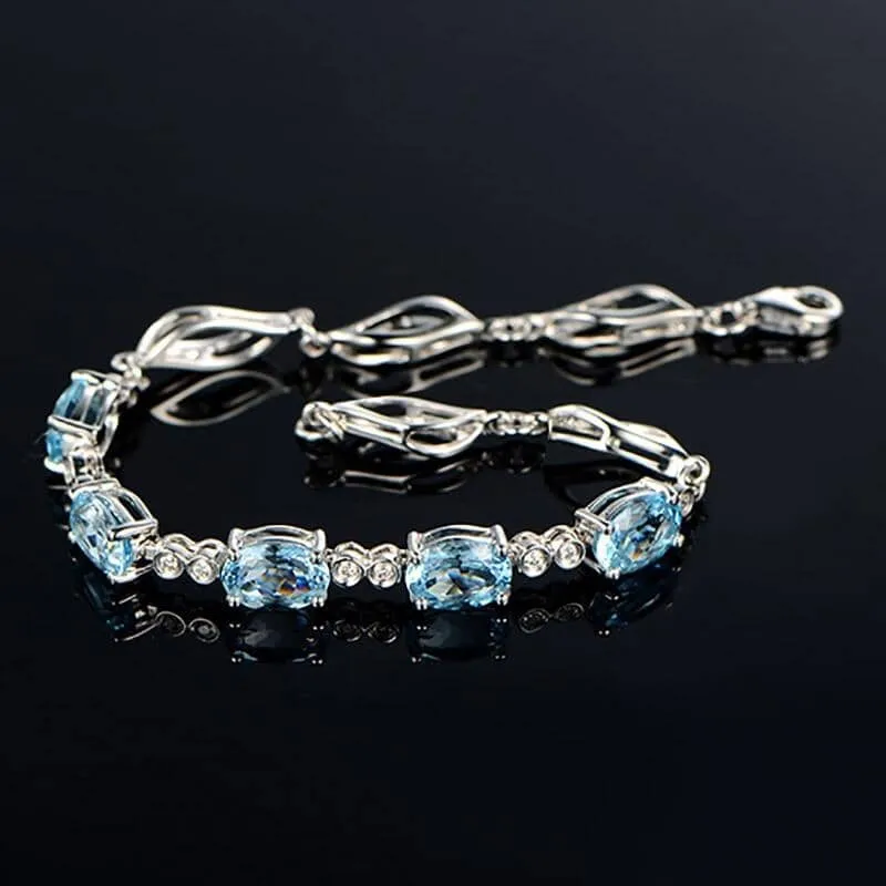 Sterling Silver Blue Topaz Charm Bracelet