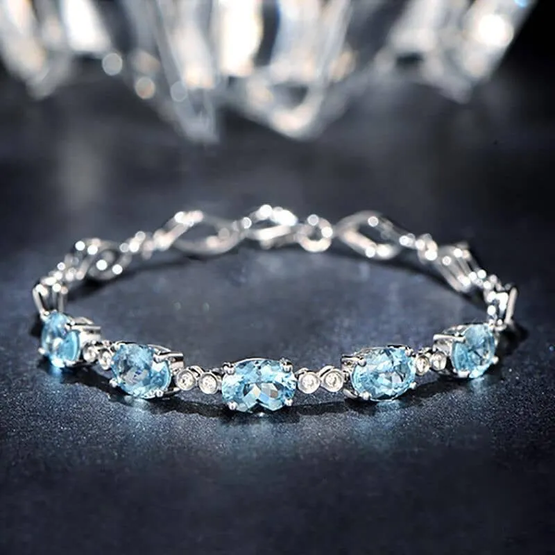 Sterling Silver Blue Topaz Charm Bracelet